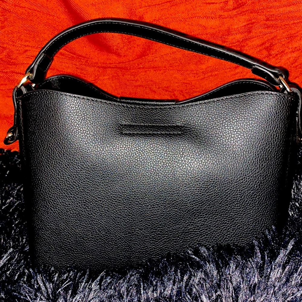 Cute Black Crossi purse perfect for that night out